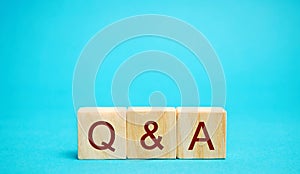 Wooden blocks Q&A  question and answer concept. Communication, brainstorming, business. Search for information. Ask for an photo