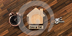 Wooden blocks in shape of a house with text CURFEW TIME