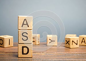 Wooden blocks with the word ASD - Autism Spectrum Disorder. Neurological and developmental disorder photo