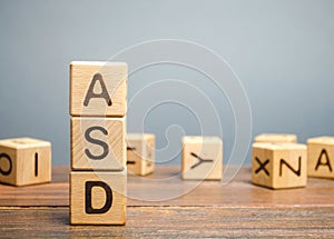 Wooden blocks with the word ASD - Autism Spectrum Disorder. Neurological and developmental disorder