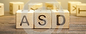 Wooden blocks with the word ASD - Autism Spectrum Disorder. Neurological and developmental disorder