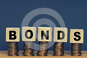 Wooden blocks with the word Bonds. Equivalent loan