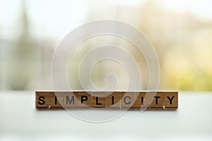 Wooden blocks with word SIMPLICITY