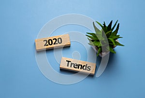 Wooden blocks with the word Trends 2020. Main trend of changing something. Popular and relevant topics. New ideological trends of