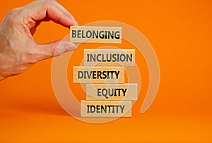Wooden blocks with words identity  equity  diversity  inclusion 