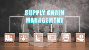 Wooden blok on desk with supply chain management icon on virtual screen