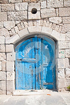 Wooden blue door in Madaba