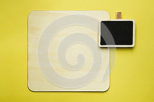 Wooden Board and a Clip-On Note Boards on Clean Yellow Background