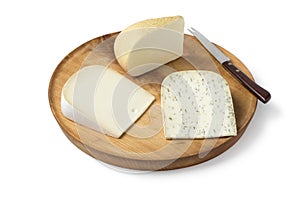 Wooden board with diversity of Dutch goat cheese