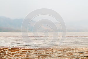 Wooden board empty table in front of blurred background. Perspec