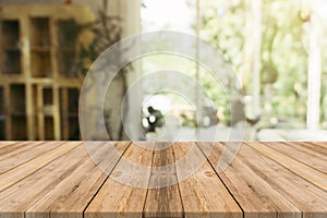 Wooden board empty table in front of blurred background. Perspec