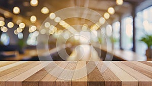 Wooden board empty table in front of blurred background. Perspective brown wood over blur in coffee shop - can be used for display