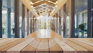 Wooden board empty table in front of blurred background. Perspective brown wood over blur in coffee shop - can be used for display