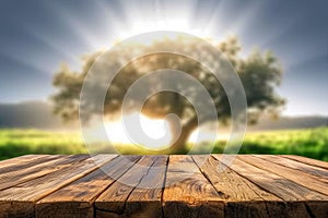 Wooden board empty table in front of blurred background. Perspective brown wood over blur trees in forest can be used mock up for