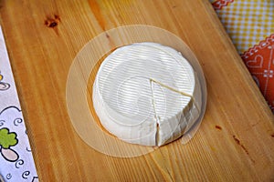 Wooden board with italian cheese