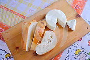 Wooden board with italian cheese and honey