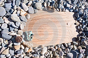 Wooden board in stone on the beach Background, billboard