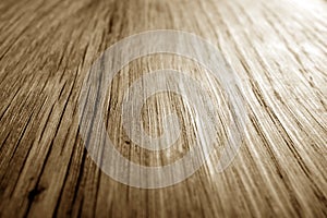 Wooden board texture with blur effect in brown tone