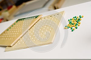 Wooden board to learn to count numbers and do mathematical operations