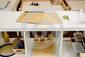 Wooden board to learn to count numbers and do mathematical operations