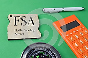 Wooden board written with FSA stands for Flexibel Spending Account
