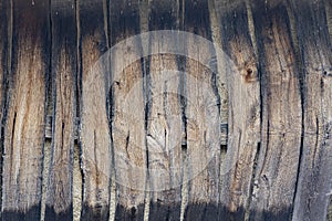 Wooden boards from a barn slightly burnt by a fire. fire resistance. rustic background. weather resistance