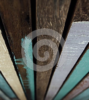 Wooden boards painted with colorful paint. Background old colored wooden paints