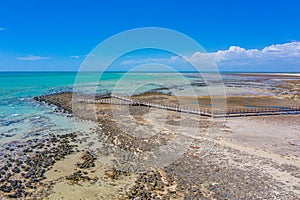 Wooden boardwalk at Hamelin pool used for view at stromatolites, Australia