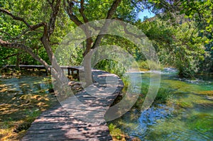 Wooden boardwalk leading through Krka national park in Croatia