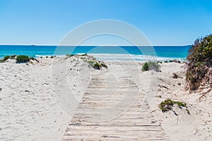 Wooden boardwalk in Maria Pia beach photo