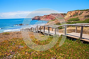 wooden boardwalk to bathing beach Praia do Amado, west Algarve, Portugal