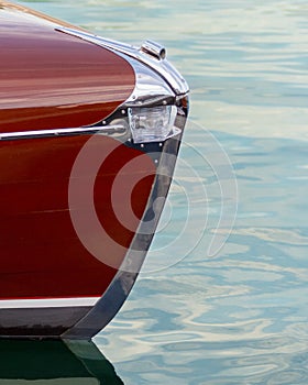 Wooden boat adorned with chrome light housing