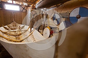 Wooden boat in the barn