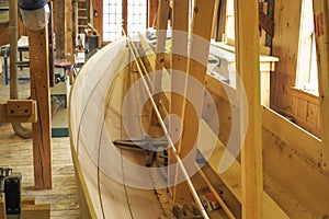 A wooden boat being built