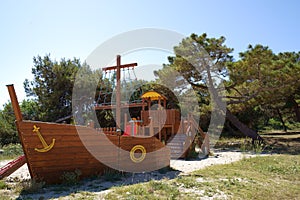 Wooden boat on the children`s playground