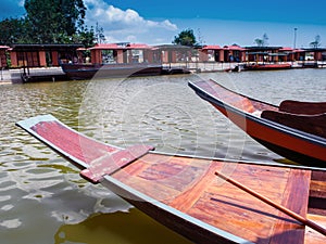 Wooden boat float in canel