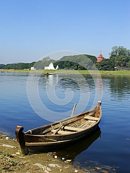 Wooden boat at the lake, Amarapura, Myanmar photo