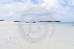 wooden boat moored near the shore at sunny day