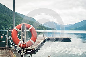 Wooden boat pier on mountain lake