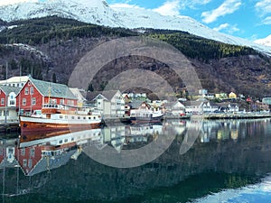 Wooden boat in port of Odda, Norway