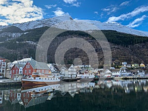 Wooden boat in port of Odda, Norway