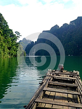 Wooden boat in Ratchaprapa Dam