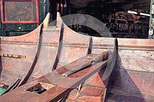 Wooden boat restoration. Shipwright woodwork workshop photo