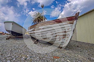 Wooden boat by the sea ready for summer season in Varazze liguria Italy