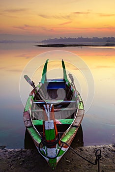 Wooden boat at sunrise, Mandalay, Myanmar