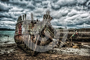 Wooden boat wreck in Brittany - France