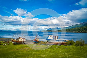 Wooden boats on coast photo