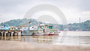 Wooden boats docked in Mahakam river