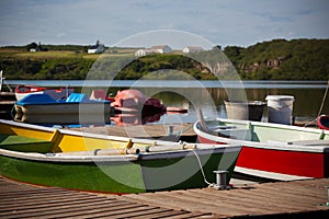 Wooden Boats with Paddles in a Lake