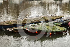 Wooden boats on river Thames